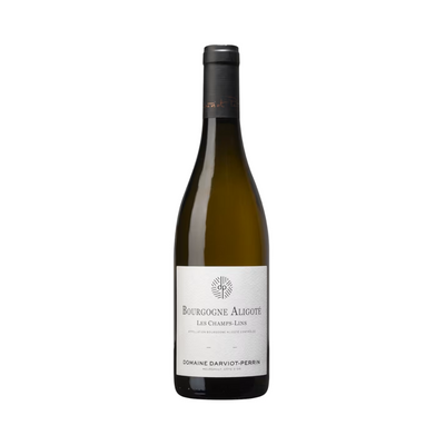 Bottle of Domaine Darviot-Perrin Bourgogne Aligoté Les Champs-Lin 2023 placed on limestone soil in Burgundy vineyard.