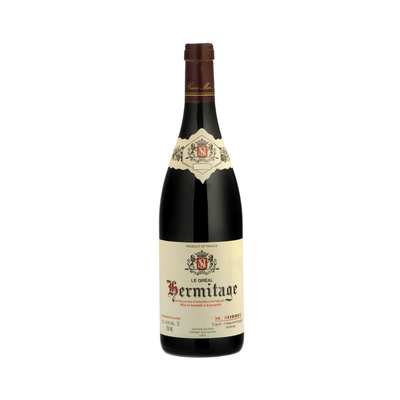 Bottle of Domaine Marc Sorrel Hermitage Rouge Le Gréal 2023 standing on granite soil in the Rhône Valley vineyard.