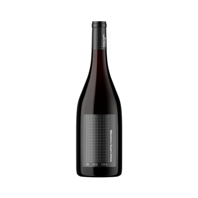 Bottle of Milimétrico Quatro Vinhas 2016, a small-production Portuguese red wine made from Merlot and Alicante Bouschet, photographed on a clean background.