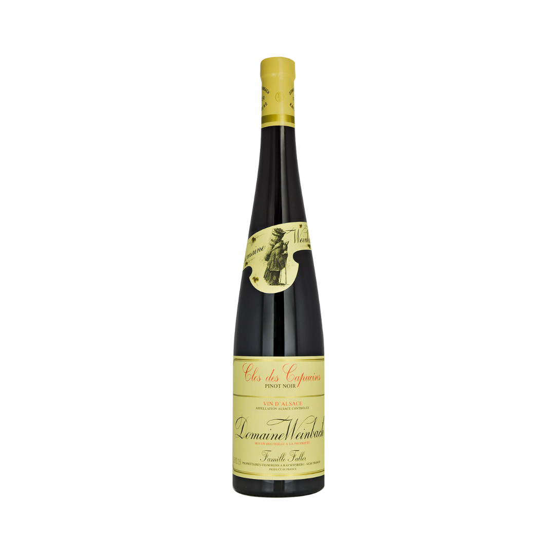 Bottle of Domaine Weinbach Pinot Noir Clos des Capucins 2023 – biodynamic red wine from Alsace with red fruit, silky tannins, and a juicy finish.

