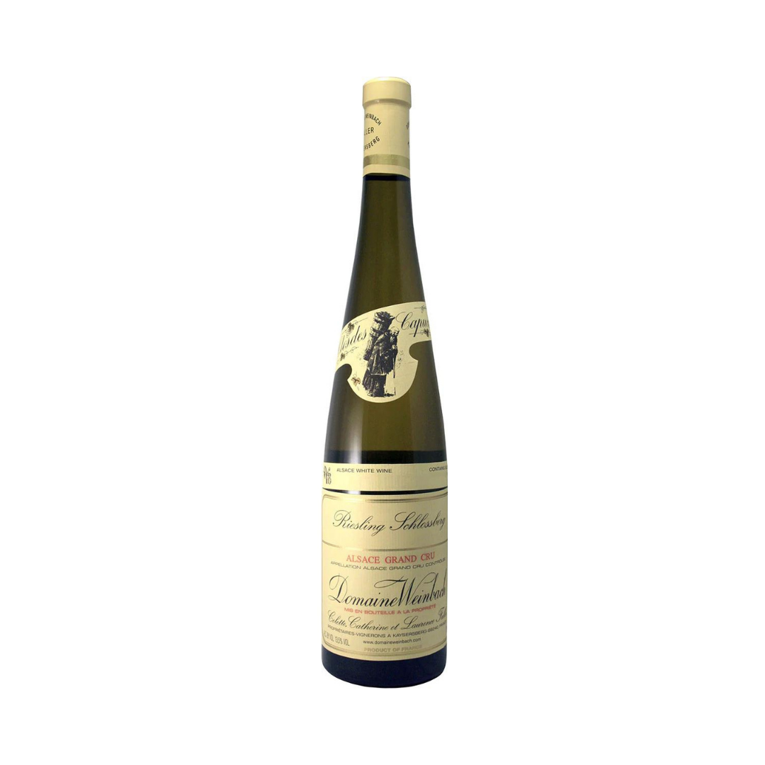 Bottle of Domaine Weinbach Riesling Schlossberg Grand Cru 2023 – biodynamic dry white wine from Alsace, granite-driven, rich and precise. 17 pts Jancis Robinson.

